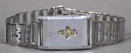 A 1930s gentleman's steel cased Jump Hour Digital wristwatch The rectangular case with three shaped