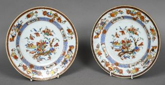 A pair of 18th century Chinese porcelain plates Each decorated with floral sprays,