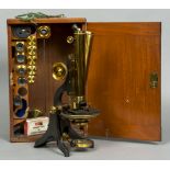 A 19th century binocular microscope by J Swift & Son, Tottenham Court Road,