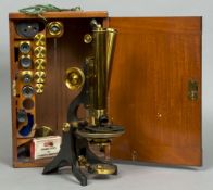 A 19th century binocular microscope by J Swift & Son, Tottenham Court Road,