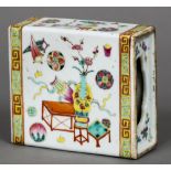 A late 19th century Chinese famille rose flower brick Of typical pierced rectangular section form,