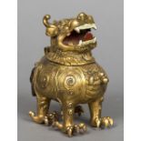 A Chinese gilt bronze censor and cover Formed as a mythical beast, cast four character mark to base.