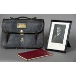 A George VI leather satchel by John Peck & Son With gilt royal cypher, the lock stamped Bramah,