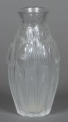 A modern Lalique Tulips pattern crystal vase Engraved signature. 17 cm high.