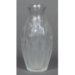 A modern Lalique Tulips pattern crystal vase Engraved signature. 17 cm high.