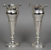 A pair of George V silver vases, each hallmarked Sheffield 1918,