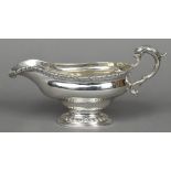 An 18th century Scottish silver pedestal sauce boat, possibly hallmarked for Edinburgh 1758,