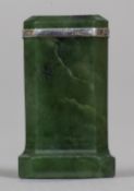 A small spinach jade desk seal Mounted with a diamond set unmarked white metal band. 3.75 cm high.