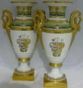 A pair of KPM Berlin porcelain twin handle vases Each decorated with heraldic motifs,