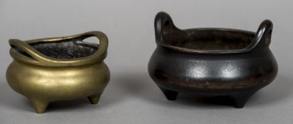 A Chinese bronze twin handled censor With cast archaistic seal mark to base;