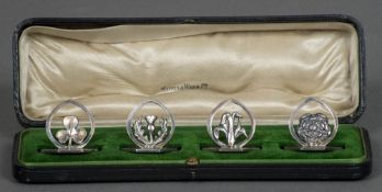 A set of four Edwardian silver menu holders, hallmarked Birmingham 1909, maker's mark of Walker,