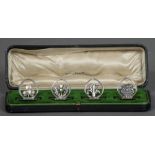 A set of four Edwardian silver menu holders, hallmarked Birmingham 1909, maker's mark of Walker,