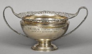 A silver presentation twin handled pedestal bowl, hallmarked Sheffield 1917,