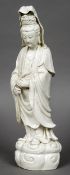 A Chinese blanc de chine figure of Guanyin Typically modelled,