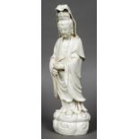 A Chinese blanc de chine figure of Guanyin Typically modelled,