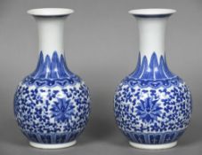 A pair of Chinese blue and white porcelain baluster vases Each decorated with lotus strapwork.