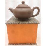 A Yixing pottery teapot Of typical form, with faux bamboo handle and spout,