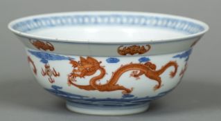 A Chinese porcelain bowl With flared rim, the interior decorated with a five clawed dragon,