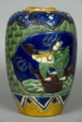 A large Chinese pottery vase Of ovoid form, decorated with vignettes of dogs-of-fo,