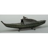 A Japanese Meiji period bronze koro Formed as a boat with a removable thatched roof mounted with a