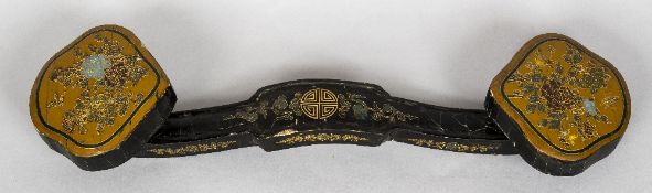 A Chinese lacquered ruyi sceptre Of typical form, decorated with floral sprays and scrolls,