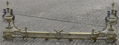 A 19th century gilt metal extending fire curb Of typical form,