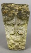 An antique stone carving Modelled as a Bacchic mask. 37.5 cm high.