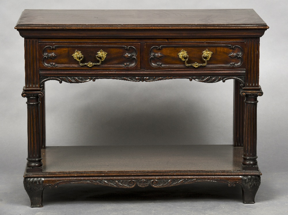 A Victorian mahogany side table by Jas Shoolbred & Co The moulded rectangular top above two moulded