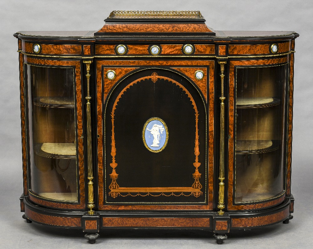 A Victorian jasper porcelain and gilt metal mounted amboyna inlaid ebonised credenza The three