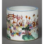 A 19th century Chinse porcelain brush pot Extensively painted with celebratory figures in a