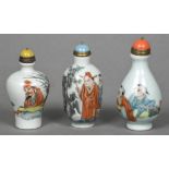 Three Chinese porcelain snuff bottles Of baluster form,