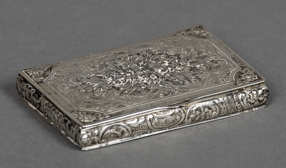A Continental silver card case/snuff box With embossed floral decoration. 8 cm wide.