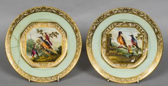 A pair of early 19th century Derby porcelain plates Centrally painted with exotic birds,