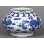 A Chinese blue and white porcelain bowl Of squat baluster form,