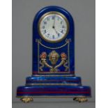 A Russian silver gilt mounted lapis lazuli desk clock The white guilloche enamel dial with Arabic