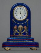 A Russian silver gilt mounted lapis lazuli desk clock The white guilloche enamel dial with Arabic