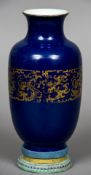 A Chinese porcelain powder blue vase, possibly 19th century Decorated with an archaistic gilt band,