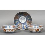 A set of three 19th/20th century Japanese Arita porcelain bowls Comprising: one larger and a