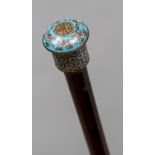 A Chinese cloisonne mounted walking stick The cloisonne knop finial above the turned shaft with