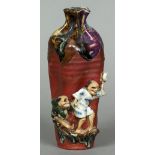 A Japanese Studio pottery vase Of crimped form, with applied figures,