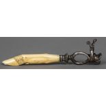 An ivory mounted silver plated venison bone holder The handle carved as a hoof. 22 cm long.