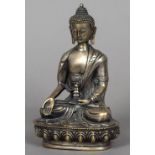 A Chinese silvered bronze figure of Buddha Typically modelled seated. 20 cm high.