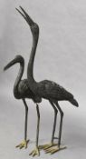 A pair of cast bronze garden fountains Each formed as a stork. The largest 110 cm high.