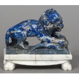 A Chinese carved lapis lazuli animalier group Modelled as a lion attacking a crocodile,