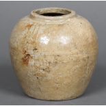 An antique Chinese Provincial pottery jar Of plain glazed ovoid form,