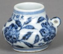 A small Chinese blue and white porcelain vessel Of baluster form, with suspension loop,