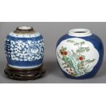 A small 19th century Chinese blue and white ginger jar Mounted on a pierced wooden stand;