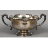 A silver twin handled rose bowl, hallmarked Birmingham 1930,