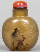 A Chinese carved shadow agate snuff bottle and stopper Worked with the figure of a bird. 6 cm high.