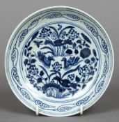 A Chinese blue and white porcelain saucer Decorated with Mandarin ducks amongst aquatic plants and